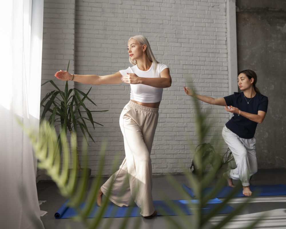full-shot-women-practising-tai-chi-together